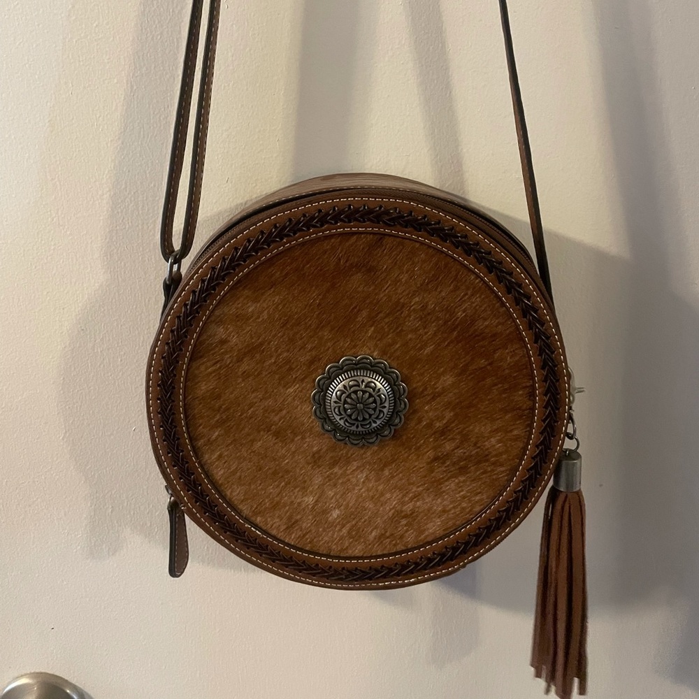 Genuine Cowhide round purse-lightly used